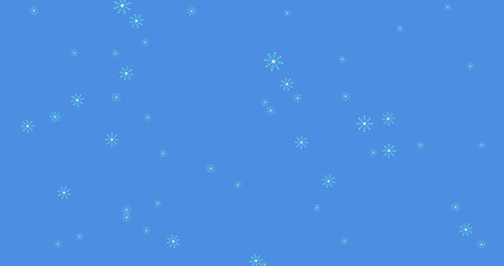 Digital image of multiple snowflakes icons falling against blue background