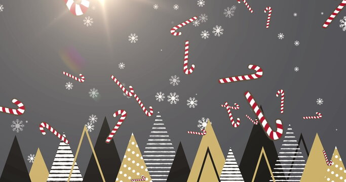 Naklejki Multiple candy cane icons falling over multiple christmas tree icons on grey background