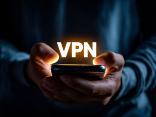 Person using smartphone with glowing vpn letters symbolizing secure internet connection and online privacy protection in a dark setting