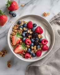 Healthy breakfast bowl with yogurt, strawberries, and blueberries on marble surface, editorial food photography highlighting nutrition, freshness, and the balanced charm of modern healthy lifestyle