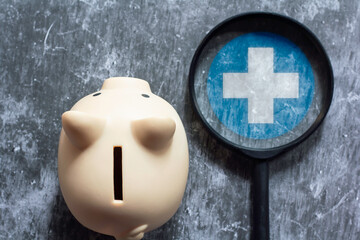 Top view of a piggy bank with the basic concept of financial health check.