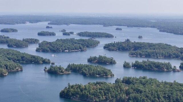 Aerial view of lush islands and blue water in the 1000 Islands region, St. Lawrence River, Canada. g