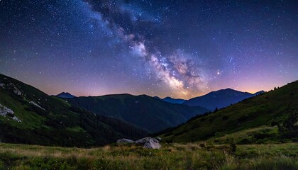 Breathtaking panorama of the Milky Way galaxy glowing above a serene mountain valley on a clear starry night