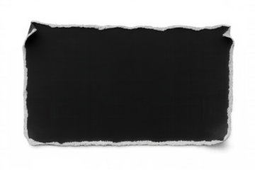 Ripped black paper sheet with torn edges and curled corner presenting blank space, isolated on transparent background