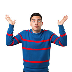Fototapeta premium Young Caucasian man in a blue and red striped sweater shrugging with a confused or uncertain expression, isolated on a black background.