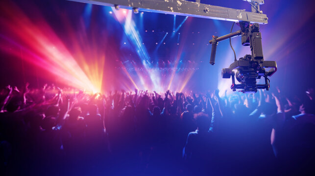 Professional filming equipment. Camera filming disco. Camera for broadcasting concert. Filming equipment for recording nightlife. Professional equipment for live broadcasting from concert.