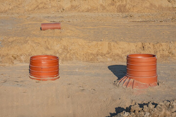 Drainage system. Laying utility lines during construction. Drainage wells inside construction pit....
