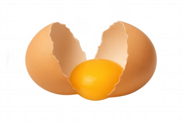 Broken brown egg showing raw yolk and cracked eggshell, preparing food ingredient for cooking