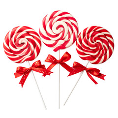 Fototapeta premium Three red and white swirl lollipops with red bows isolated on transparent background.
