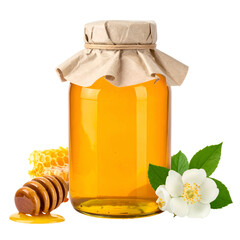 A jar of golden honey sits beside a honeycomb and a white blossom.