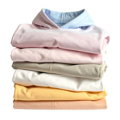 Stack of folded pastel colored clothing items on black background.