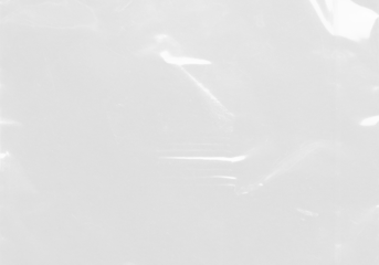 plastic transparent cellophane bag on white background. The texture looks blank and shiny. The plastic surface is wrinkly and tattered making abstract pattern