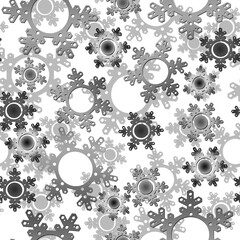 Cut paper snowflakes black and white gray background