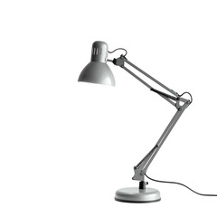 Light illuminates from an adjustable desk lamp on a dark background.
