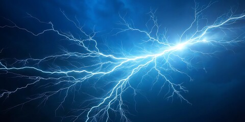 Fototapeta premium Intense electric blue lightning strikes across a dark stormy sky illuminating the night with powerful branching energy and a bright central flash