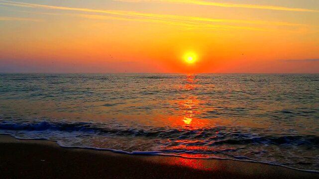 Beautiful summer sunrise over the beach