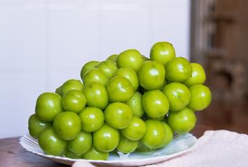 Grapes on a platter. Large green grapes.