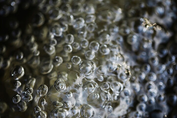 Abstract Water Bubbles Background: Captivating Close-Up of Shimmering Liquid Spheres