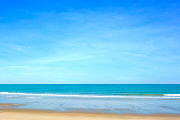 Nature of the ocean and blue sky Summer with sunshine, sandy beaches, clear blue waters sparkling against the blue sky. on an island with good ecology and environment Background for summer vacation