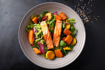 Salmon and sweet potato salad beautifully plated to inspire healthy lifestyle and food awareness

