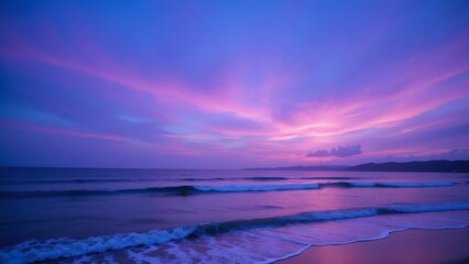 Fototapeta premium Coastal sunset with vibrant pink and purple hues over the ocean