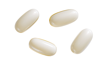 Four light cream-colored oval pills scattered