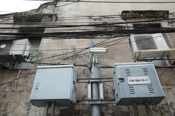 The CCTV camera and electrical control panel were installed on an old concrete wall.