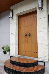 Chinese style ancient door. The cafe's doors were open (2 doors). Chinese style wooden door.