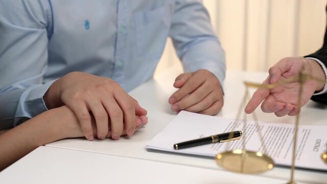 Loving couple seek legal consultation and assistance from law firm, discuss marriage law, proposal weddings and spousal support. Lawyer providing advice on marriage certification. Slow motion. Rigid.