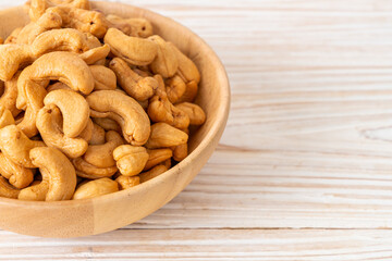 Cashew nuts in wooden bowl