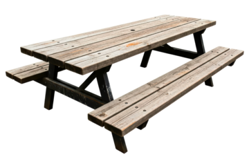 Rustic weathered wooden picnic table with attached benches on a transparent background