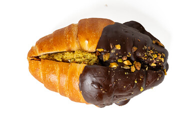 High-resolution photograph of a chocolate croissant isolate on white, taken with a high-resolution 45MP camera