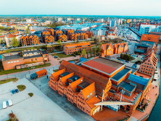 Gdansk with Motlawa river in Poland. Aerial landscape of the Main Town. Old town colourful house with Polish Baltic Philharmonic
