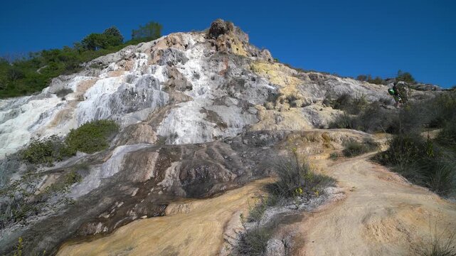 Parco naturale dei Mulini, public park with hot springs and dismantled system of grain mills at Bagno Vignoni, town in the province of Siena, Italy	