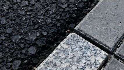 This textured asphalt surface provides a versatile backdrop for various creative projects and design applications