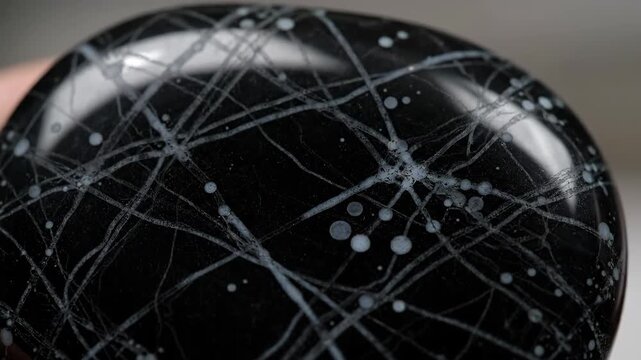 Futuristic network lines and nodes on dark metal