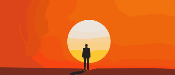 夕日を背にした男性のシルエット	