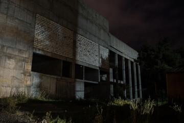 Fototapeta premium Abandoned City Streets at Night. Nobody at buildings.