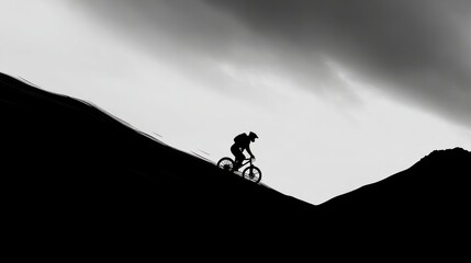 Biker climbing mountain
