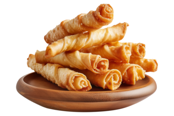 Fried cheese sticks wrapped in dough or spring rolls stacked in pile on wooden plate, isolated on white transparent background, concept of Venezuela cuisine snack