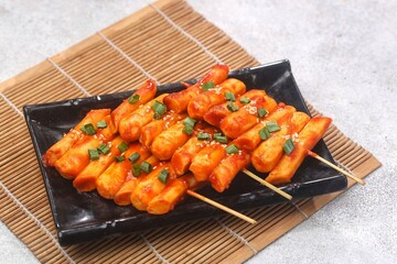 Sotteok so-tteok (소떡소떡), sometimes translated as sausage and rice cake, is a popular South Korean street food consisting of garae-tteok (rice cake) and Vienna sausage skewered and fried