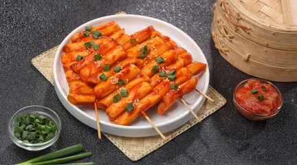 Sotteok so-tteok (소떡소떡), sometimes translated as sausage and rice cake, is a popular South Korean street food consisting of garae-tteok (rice cake) and Vienna sausage skewered and fried