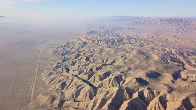  drone footage showing the dramatic Temblor Range in the Carrizo Plain National Monument, California. The video captures the striking folds, ridges, and fault lines carved by the San Andreas Fault.