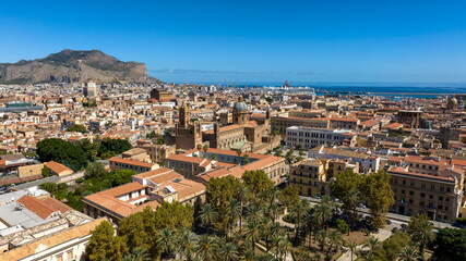 Obraz premium City skyline of Palermo, Sicily, Italy. In the foreground is the city's cathedral in the historic center. In the background is the port on the Tyrrhenian Sea.