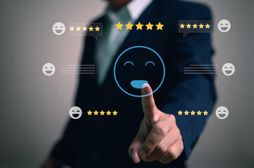Businessman selecting a happy face icon for a positive customer review. The virtual interface with 5star ratings symbolizes excellent service experience and high satisfaction feedback for a business.