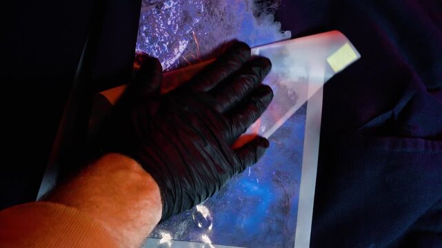 autumn holiday Halloween 2025 scary pumpkins digital printing technology on textiles direct to film at home transferring an image from film to a t-shirt or fabric in blood red light in the dark