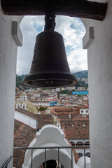 Fototapeta premium View of San Francisco church bell tower and Quito city