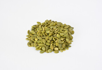 A Heap of Green Pumpkin Seeds on white background