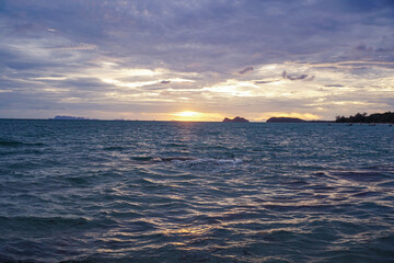 Panoramic beach landscape in Thailand. Inspire tropical beach seascape horizon. Sunset sky calmness tranquil relaxing sunlight summer mood. Tropical beach at sunset, light sand, and a blurred horizon.