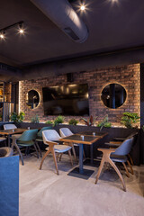Modern restaurant with stylish lighting and inviting seating